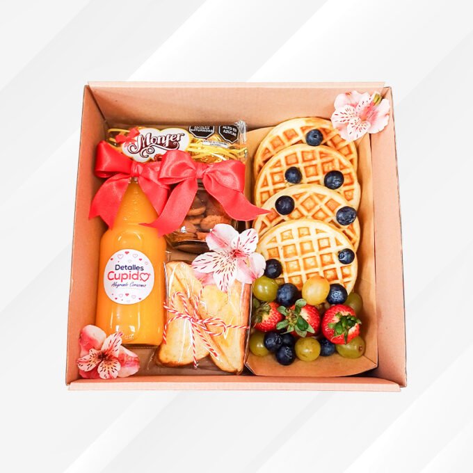 Wafles + Frutas + Sandwich mixto+ jugo + frasco galletas + chocolates en caja enmicada